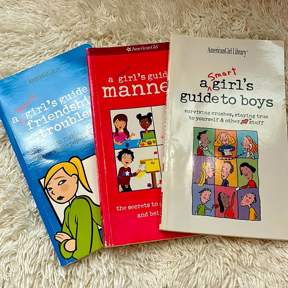 3 gently used hardly a page turned American girl library books .
